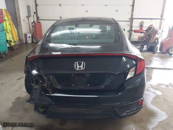 2018 Honda Civic Coupe LX-P with VIN 2HGFC4B09JH302679, listed as a IAAI auction lot 41620637 with NaN miles. Bid and sale history available at carsss.com. Image 16.