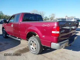2006 Ford F-150 STX with VIN 1FTRX14W26KB61678, listed as a IAAI auction lot 42043784 with 134,451 mi miles. Bid and sale history available at carsss.com. Image 3.
