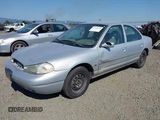 1999 Ford Contour with VIN 1FAFP653XXK167515, listed as a IAAI auction lot 42745231 with 144,236 mi miles and . Bid and sale history available at DreamBid. Image 2.