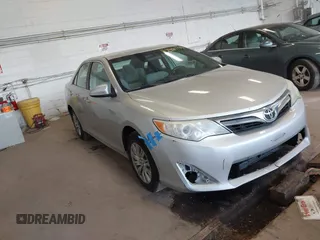 2012 Toyota Camry L z VIN 4T4BF1FK2CR201161, wystawiony jako IAAI lot #42465774 z przebiegiem 263 167 mil mil oraz . Historia ofert i sprzedaży dostępna na DreamBid. Obrazek 1.