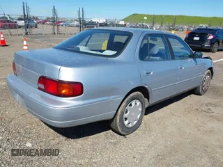 1996 Toyota Camry DX with VIN JT2BG12K4T0381387, listed as a IAAI auction lot 41866017 with 177,198 mi miles. Bid and sale history available at carsss.com. Image 4.