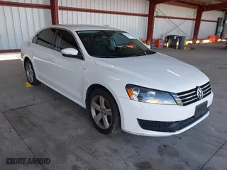 2014 Volkswagen Passat Wolfsburg Ed with VIN 1VWAS7A3XEC056627, listed as a IAAI auction lot 41756275 with 183,857 mi miles. Bid and sale history available at carsss.com. Image 1.