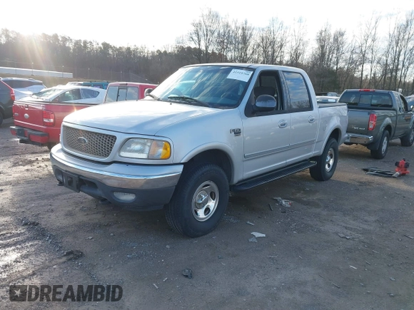 2002 Ford F-150 XLT with VIN 1FTRW08632KE22611, listed as a IAAI auction lot 41519768 with 200,420 mi miles. Bid and sale history available at carsss.com. Image 2.