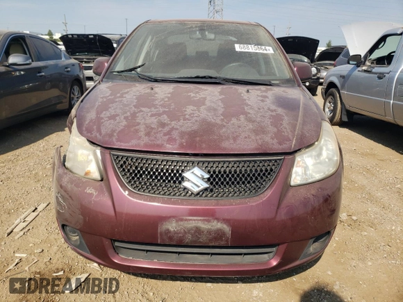 2011 Suzuki SX4 LE with VIN JS2YC5A2XB6302991, listed as a Copart auction lot 68815864 with 82,464 mi miles and Salvage Title. Bid and sale history available at carsss.com. Image 5.