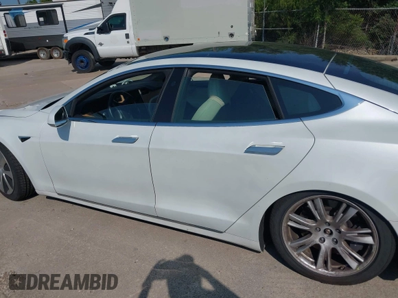 2020 Tesla Model S Long Range with VIN 5YJSA1E29LF389023, listed as a IAAI auction lot 42509364 with 93,070 mi miles and . Bid and sale history available at DreamBid. Image 13.