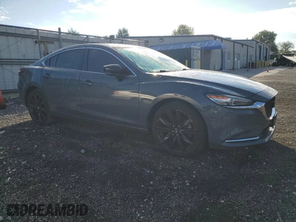 2021 Mazda 6 Grand Touring Reserve with VIN JM1GL1WY3M1602898, listed as a Copart auction lot 67871314 with 104,679 mi miles and Salvage Title. Bid and sale history available at DreamBid. Image 4.