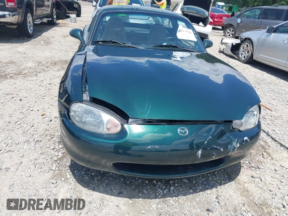1999 Mazda MX-5 Miata with VIN JM1NB3539X0123231, listed as a IAAI auction lot 42314156 with 154,755 mi miles and . Bid and sale history available at DreamBid. Image 18.