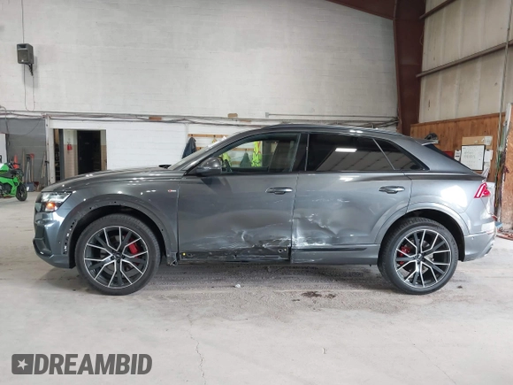 2020 Audi Q8 Premium Plus with VIN WA1EVAF14LD015881, listed as a IAAI auction lot 42646808 with 46,136 mi miles and . Bid and sale history available at DreamBid. Image 14.