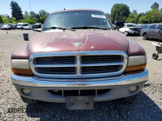 2001 Dodge Dakota z VIN 1B7GG2AZ41S152288, wystawiony jako Copart lot #59952635 z przebiegiem 167 721 mil mil oraz Czysty tytuł • Clean title. Historia ofert i sprzedaży dostępna na DreamBid. Obrazek 5.
