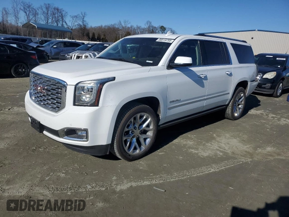 2019 GMC Yukon XL Denali with VIN 1GKS2HKJ2KR103446, listed as a Copart auction lot 88519755 with 77,779 mi miles and Salvage Title. Bid and sale history available at DreamBid. Image 1.