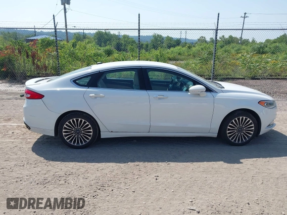 2017 Ford Fusion Titanium with VIN 3FA6P0K90HR168031, listed as a IAAI auction lot 42578926 with 210,268 mi miles and . Bid and sale history available at DreamBid. Image 13.