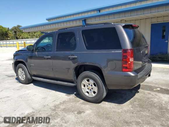 2010 Chevrolet Tahoe LS with VIN 1GNMCAE33AR127864, listed as a Copart auction lot 49458425 with 108,625 mi miles and Salvage title. Bid and sale history available at DreamBid. Image 2.