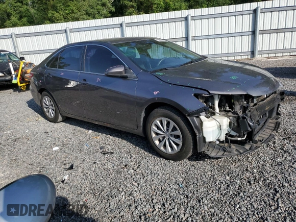 2015 Toyota Camry XLE with VIN 4T1BF1FKXFU899517, listed as a Copart auction lot 56001835 with 124,675 mi miles and Salvage Title. Bid and sale history available at DreamBid. Image 4.