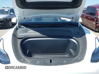 2024 Tesla Model Y with VIN 7SAYGDED0RA327806, listed as a IAAI auction lot 42096752 with 13,244 mi miles and . Bid and sale history available at DreamBid. Image 10.