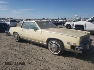1982 Cadillac Eldorado z VIN 1G6AL578XCE608090, wystawiony jako Copart lot #73839654 z przebiegiem 22 185 mil mil oraz Czysty tytuł • Clean title. Historia ofert i sprzedaży dostępna na DreamBid. Obrazek 4.
