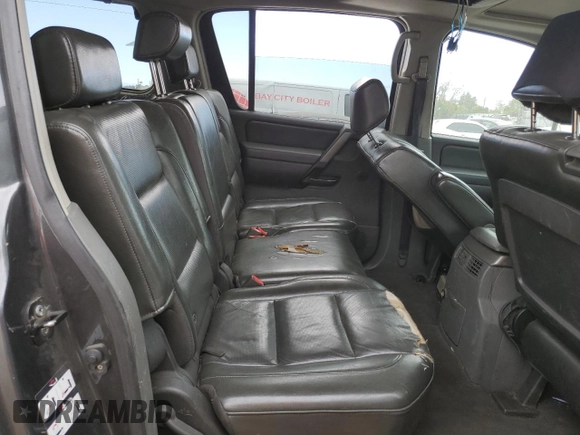 2006 Nissan Armada LE z VIN 5N1AA08A76N703892, wystawiony jako Copart lot #50604815 z przebiegiem 252 274 mil mil oraz Szkoda całkowita • Salvage title. Historia ofert i sprzedaży dostępna na DreamBid. Obrazek 11.