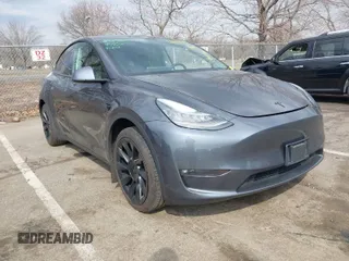 2021 Tesla Model Y Standard Range with VIN 5YJYGDED2MF118205, listed as a IAAI auction lot 41785040 with 63,628 mi miles. Bid and sale history available at carsss.com. Image 1.
