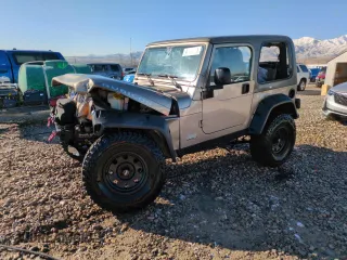 2004 Jeep Wrangler Rubicon with VIN 1J4FA69S14P749749, listed as a Copart auction lot 44458485 with 99,121 mi miles and Salvage Title. Bid and sale history available at carsss.com. Image 1.