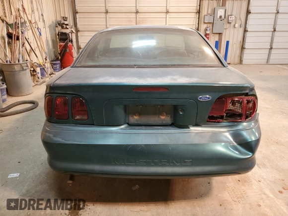 1996 Ford Mustang with VIN 1FALP4049TF152546, listed as a Copart auction lot 83665864 with 101,140 mi miles and Salvage Title. Bid and sale history available at carsss.com. Image 6.
