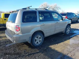 2007 Honda Pilot EX with VIN 2HKYF184X7H534943, listed as a IAAI auction lot 41818741 with 220,151 mi miles. Bid and sale history available at carsss.com. Image 4.