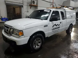2009 Ford Ranger XLT with VIN 1FTZR45E09PA61054, listed as a Copart auction lot 45170015 with 213,722 mi miles and Salvage Title. Bid and sale history available at carsss.com. Image 1.