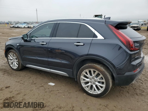 2022 Cadillac XT4 AWD Premium Luxury with VIN 1GYFZDR42NF147920, listed as a Copart auction lot 84058554 with 12,145 mi miles and Salvage Title. Bid and sale history available at carsss.com. Image 2.
