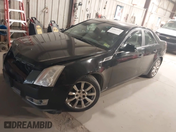 2009 Cadillac CTS AWD w/1SB with VIN 1G6DT57V290152885, listed as a IAAI auction lot 42063192 with 146,119 mi miles. Bid and sale history available at carsss.com. Image 2.