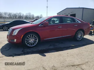 2013 Cadillac XTS Platinum with VIN 2G61V5S32D9174001, listed as a Copart auction lot 48696365 with 94,028 mi miles and Salvage Title. Bid and sale history available at carsss.com. Image 1.