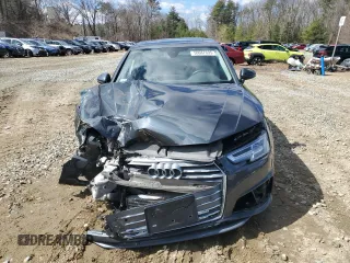 2019 Audi A4 Premium Plus с VIN WAUENAF45KN020643, выставлен на аукционе Copart как лот 50687695 с пробегом Не указан миль и Списание • Salvage title. История ставок и продаж доступна на DreamBid. Изображение 5.