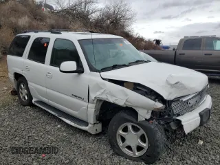 2001 GMC Yukon Denali z VIN 1GKEK63U01J287101, wystawiony jako Copart lot #43659115 z przebiegiem Nie podano mil oraz Szkoda całkowita • Salvage title. Historia ofert i sprzedaży dostępna na DreamBid. Obrazek 4.