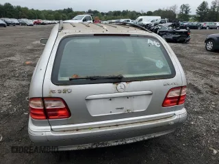 2000 Mercedes-Benz E-Class AWD with VIN WDBJH82J6YX039226, listed as a Copart auction lot 72559034 with 213,680 mi miles and Clean Title. Bid and sale history available at carsss.com. Image 6.