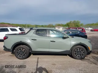 2023 Hyundai Santa Cruz SEL with VIN 5NTJBDAE9PH076525, listed as a IAAI auction lot 42332998 with 41,362 mi miles and . Bid and sale history available at DreamBid. Image 13.