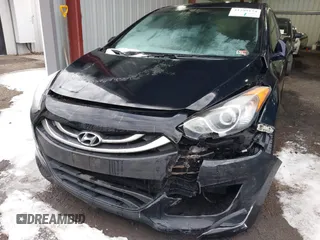 2014 Hyundai Elantra GT with VIN KMHD35LH5EU171863, listed as a IAAI auction lot 41299174 with 89,090 mi miles. Bid and sale history available at carsss.com. Image 6.
