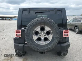 2017 Jeep Wrangler Sahara z VIN 1C4AJWBG8HL547512, wystawiony jako Copart lot #53884095 z przebiegiem 107 260 mil mil oraz Szkoda całkowita • Salvage title. Historia ofert i sprzedaży dostępna na DreamBid. Obrazek 6.
