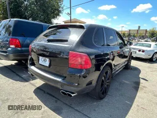 2006 Porsche Cayenne S with VIN WP1AB29PX6LA69097, listed as a Copart auction lot 52021455 with 148,871 mi miles and Salvage Title. Bid and sale history available at carsss.com. Image 4.