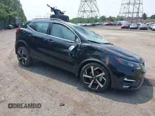 2022 Nissan Rogue SL z VIN JN1BJ1CW8NW496846, wystawiony jako IAAI lot #42380933 z przebiegiem 39 494 mil mil oraz . Historia ofert i sprzedaży dostępna na DreamBid. Obrazek 1.