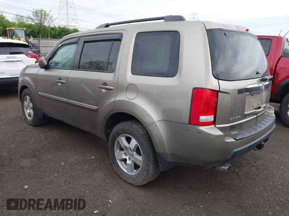 2011 Honda Pilot EX-L with VIN 5FNYF4H51BB076050, listed as a IAAI auction lot 42122883 with 143,288 mi miles and . Bid and sale history available at carsss.com. Image 3.