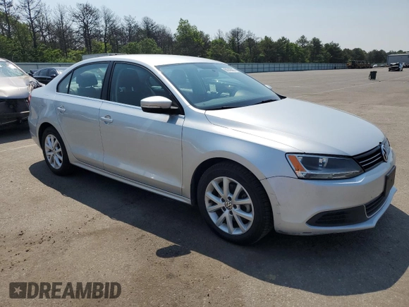 2013 Volkswagen Jetta SE with VIN 3VWDP7AJ6DM444111, listed as a Copart auction lot 60243665 with 47,005 mi miles and Salvage title. Bid and sale history available at DreamBid. Image 4.