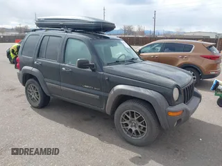 2002 Jeep Liberty Sport with VIN 1J4GL48K02W313000, listed as a IAAI auction lot 41837671 with 168,362 mi miles. Bid and sale history available at carsss.com. Image 1.
