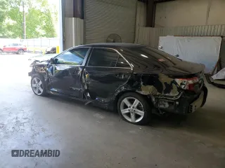 2014 Toyota Camry L with VIN 4T1BF1FK8EU323889, listed as a Copart auction lot 51933465 with 142,903 mi miles and Salvage Title. Bid and sale history available at DreamBid. Image 2.