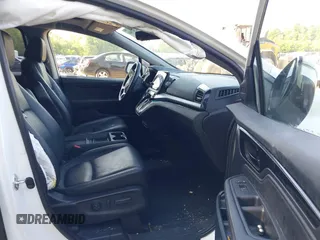 2022 Honda Odyssey Touring with VIN 5FNRL6H88NB026592, listed as a IAAI auction lot 42367048 with 57,066 mi miles and . Bid and sale history available at DreamBid. Image 5.