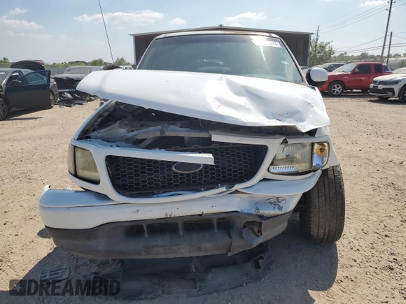 2002 Ford F-150 XL with VIN 1FTRX07W52KB08618, listed as a Copart auction lot 57941974 with 172,843 mi miles and Salvage title. Bid and sale history available at DreamBid. Image 5.
