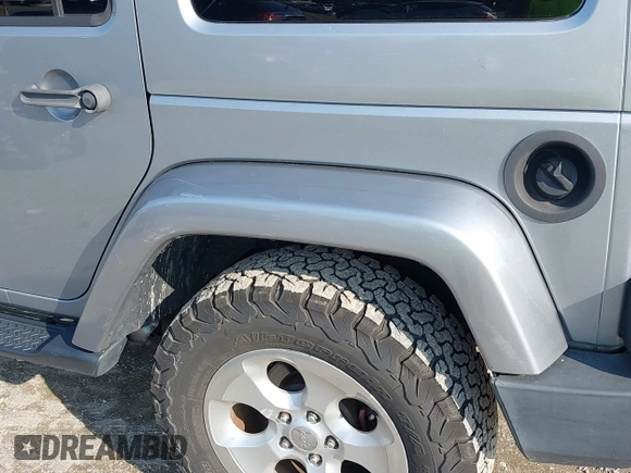 2015 Jeep Wrangler Unlimited Sahara with VIN 1C4BJWEG9FL570780, listed as a IAAI auction lot 42474940 with 116,226 mi miles and . Bid and sale history available at DreamBid. Image 12.