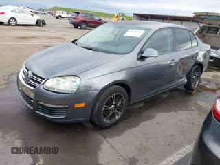 2009 Volkswagen Jetta S with VIN 3VWJZ71K49M053603, listed as a IAAI auction lot 41785816 with 100,065 mi miles and . Bid and sale history available at DreamBid. Image 2.