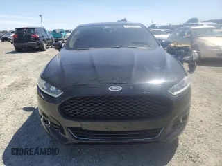 2016 Ford Fusion Titanium with VIN 3FA6P0K99GR329474, listed as a Copart auction lot 57308455 with 127,401 mi miles and Clean title. Bid and sale history available at DreamBid. Image 5.