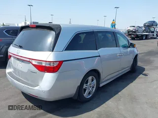 2012 Honda Odyssey Touring с VIN 5FNRL5H91CB004546, выставлен на аукционе IAAI как лот 42175002 с пробегом 118 719 миль миль и . История ставок и продаж доступна на DreamBid. Изображение 4.