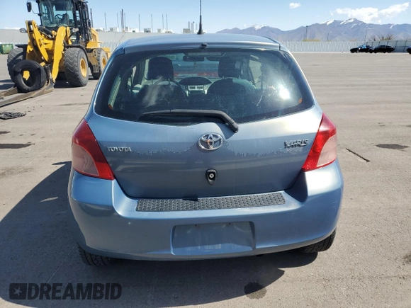 2008 Toyota Yaris with VIN JTDJT923185164654, listed as a Copart auction lot 54052575 with 242,505 mi miles and Salvage Title. Bid and sale history available at DreamBid. Image 6.