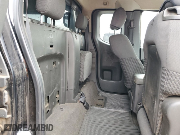 2009 Nissan Frontier SE with VIN 1N6AD06W69C400688, listed as a Copart auction lot 85140904 with 165,558 mi miles and Salvage title. Bid and sale history available at DreamBid. Image 11.