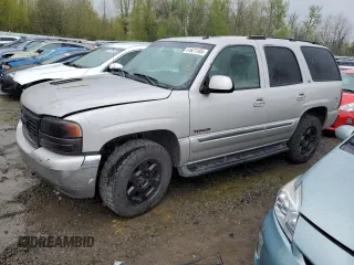 2005 GMC Yukon SLT with VIN 1GKEK13ZX5J243899, listed as a Copart auction lot 51621105 with 233,101 mi miles and Clean Title. Bid and sale history available at carsss.com. Image 1.