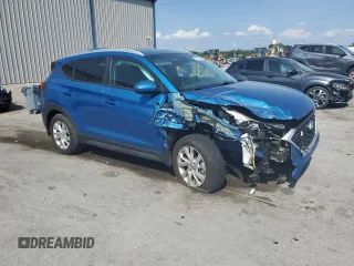 2019 Hyundai Tucson Value with VIN KM8J33A40KU025566, listed as a Copart auction lot 57965045 with 89,698 mi miles and Non repairable. Bid and sale history available at DreamBid. Image 4.